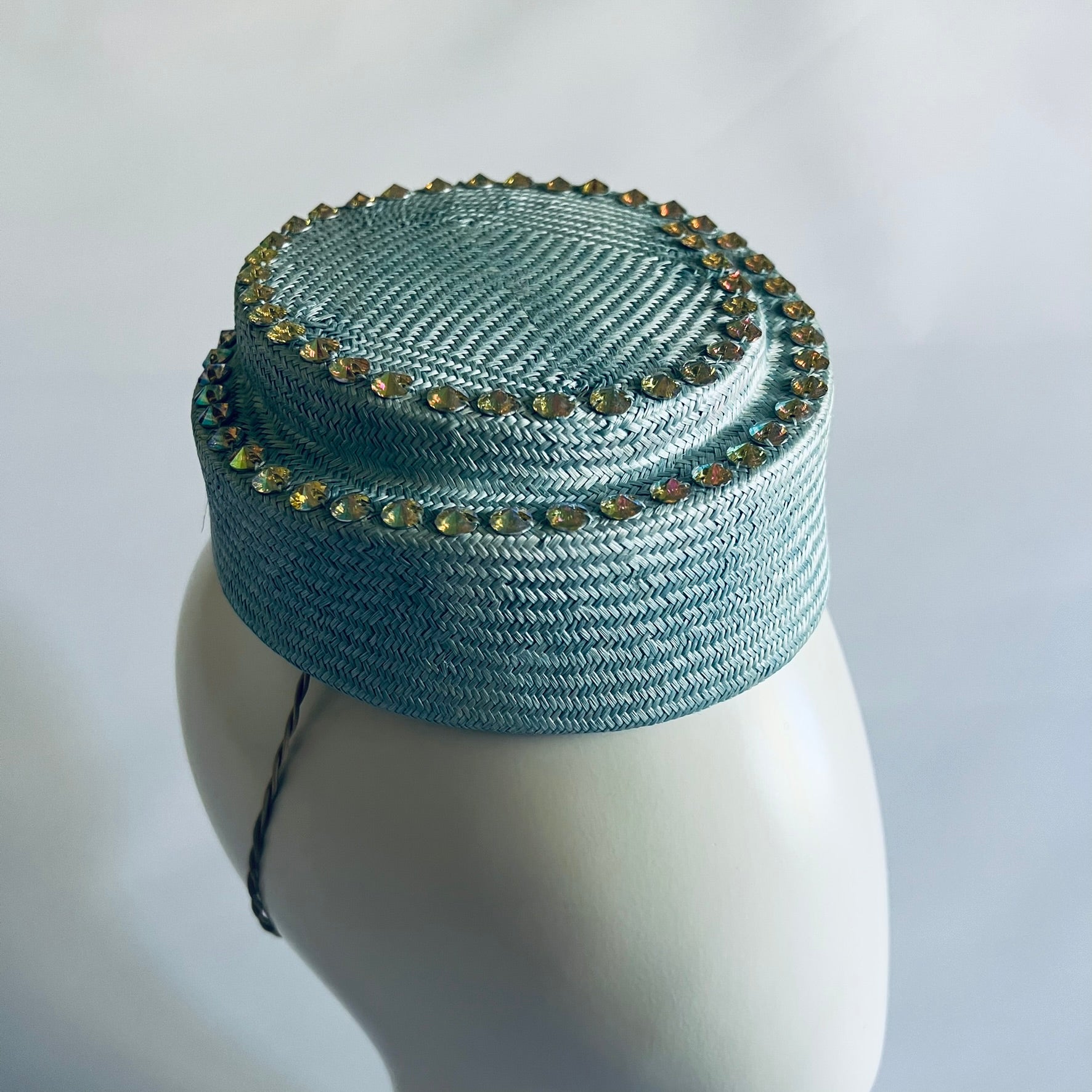 Pale blue hostess style adorned with hand sewn beads to add some sparkle.