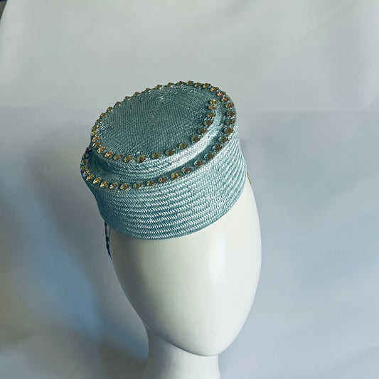 Pale blue hostess style adorned with hand sewn beads to add some sparkle.