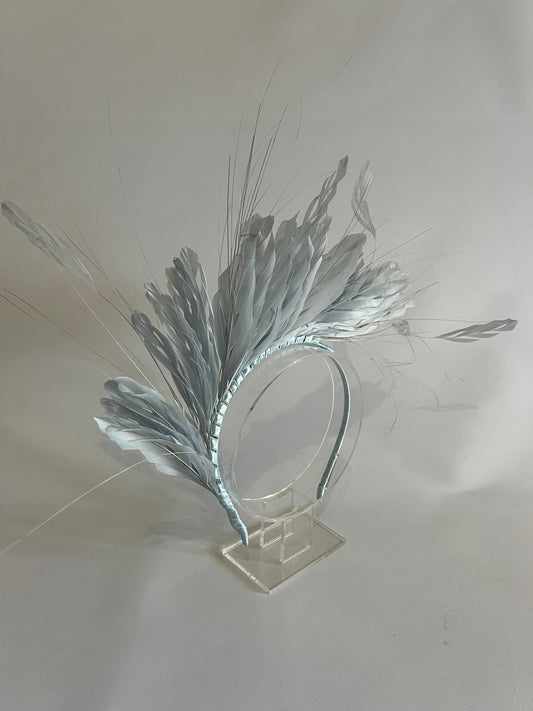 A light, comfortable feather spray available in a range of colours — the perfect finishing touch to any look.